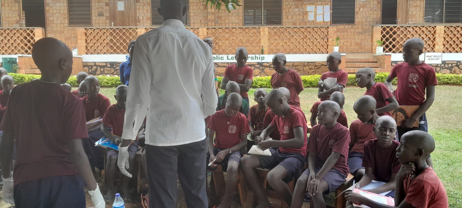 A teacher demonstrating soap-making to learners